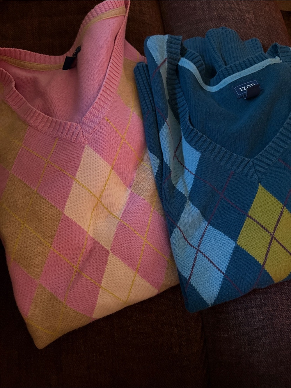 Set of two IZOD Women’s Argyle V-Neck Sweaters in Pink and Blue